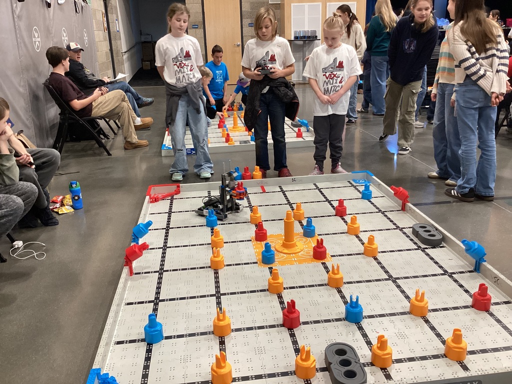 VEX students competing in a robot challenge.
