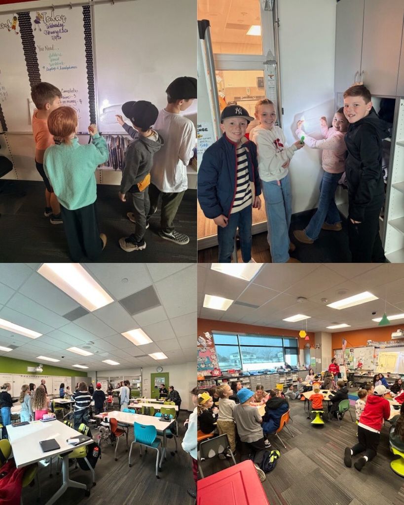 Students continue their light experiments in the classroom, shining flashlights and observing results. Sixth grade students also spend time with their kindergarten buddies during a classroom activity, working together at tables and around the room.