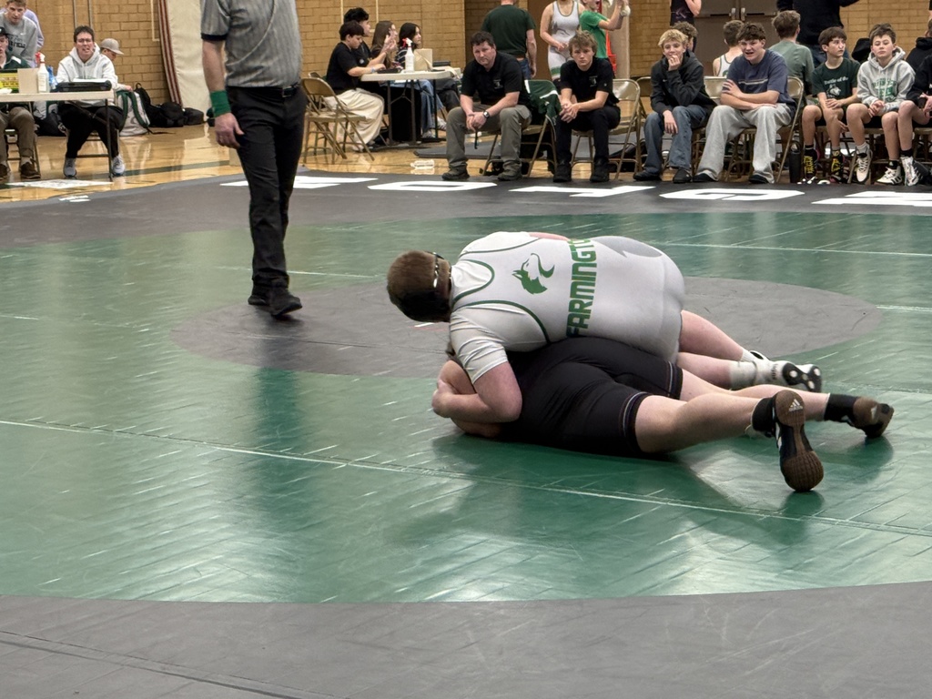 FJH wrestler going for the pin and win!