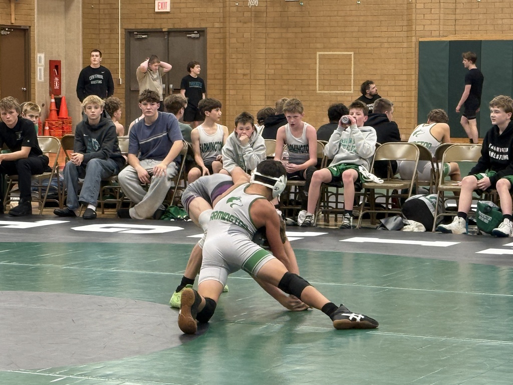 FJH wrestler against Centennial student.
