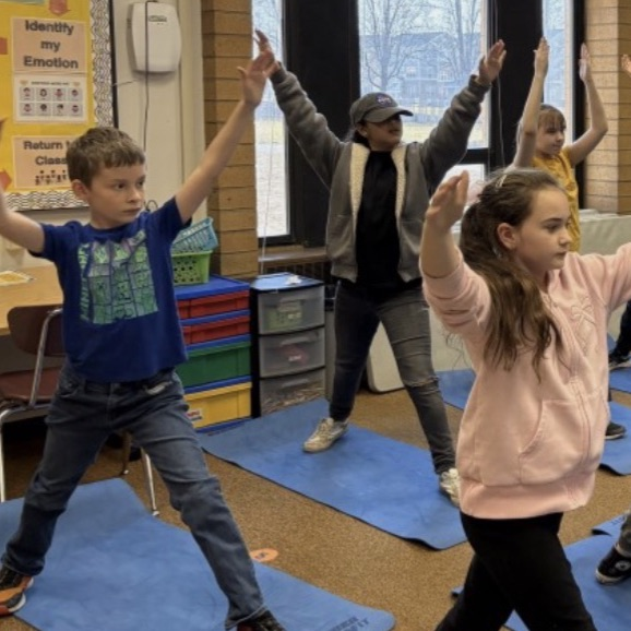 students working on dance movements during their humanities class - making geographical formations 