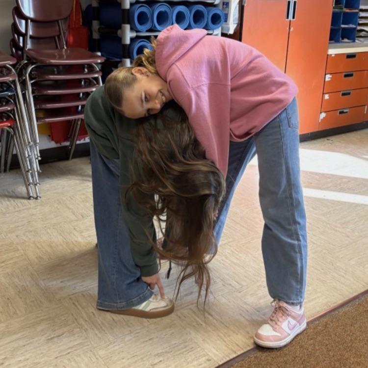 students working on dance movements during their humanities class - making geographical formations 