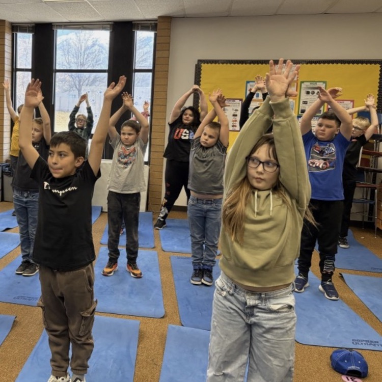 students working on dance movements during their humanities class - making geographical formations 