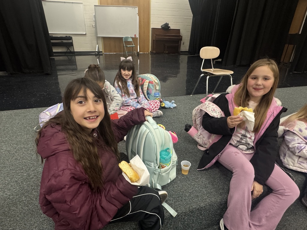 parents and students at donuts and grownups event