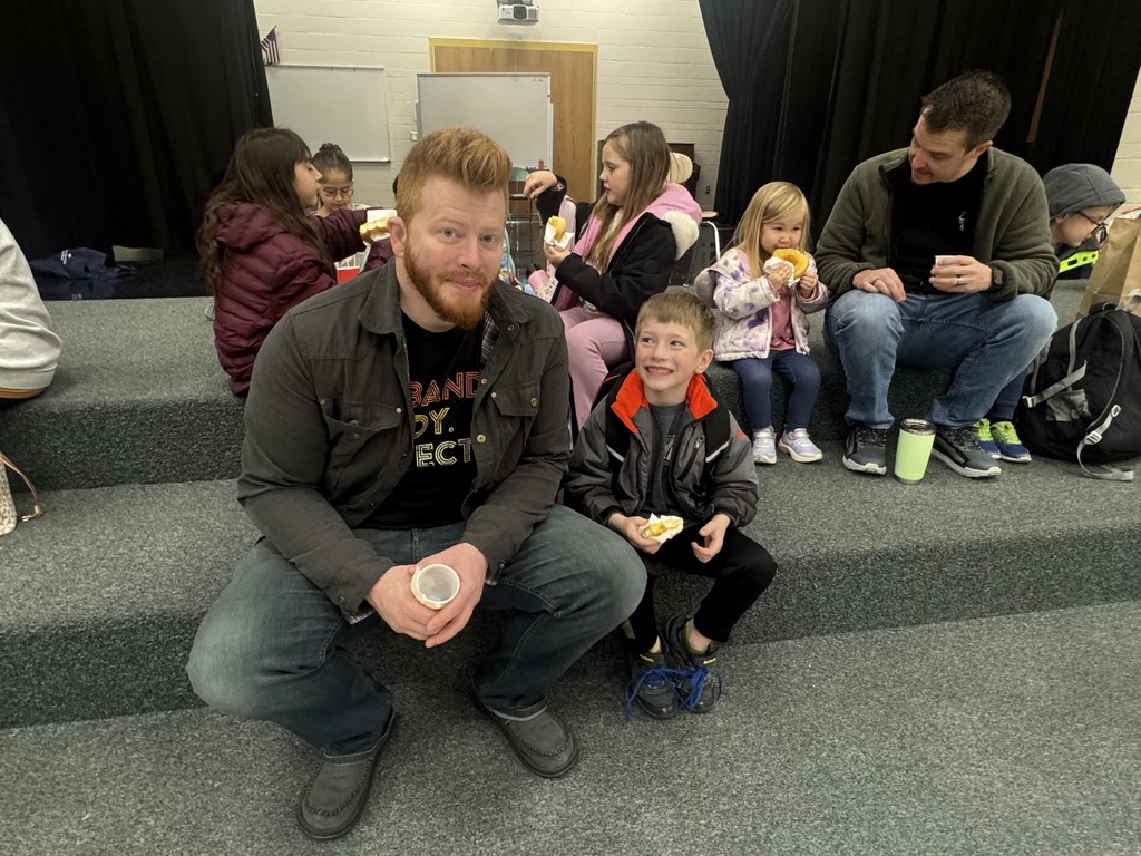 parents and students at donuts and grownups event