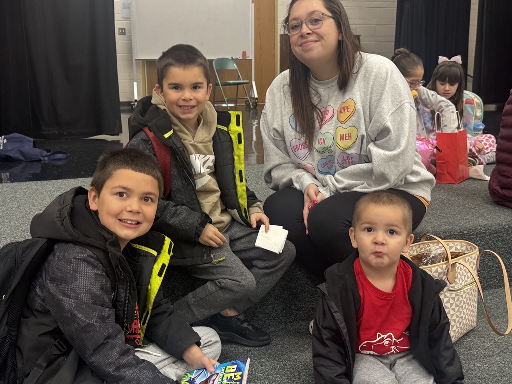 parents and students at donuts and grownups event