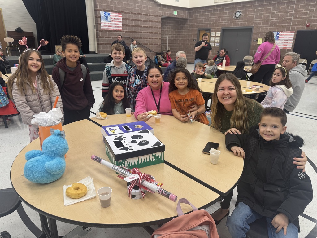 parents and students at donuts and grownups event