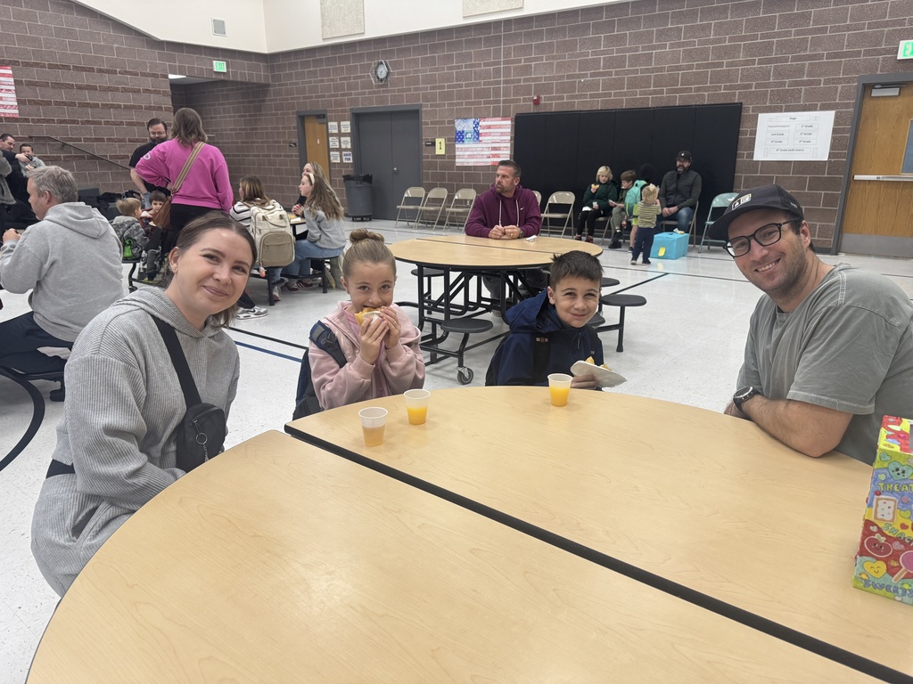 parents and students at donuts and grownups event