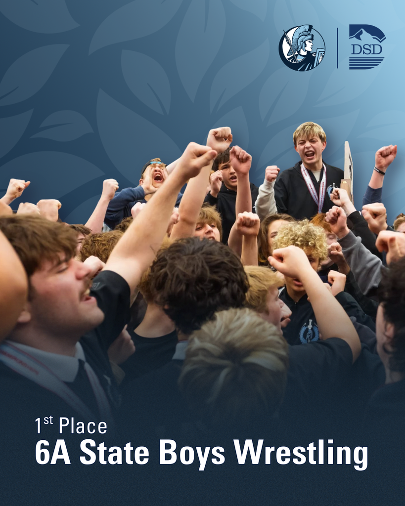 Layton High's Boys Wrestling team lifting their hands up. 1st place - 6A State Boys Wrestling
