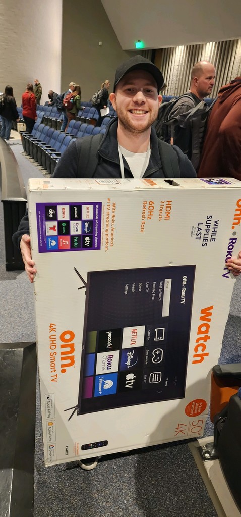 Mr. Messer with a TV that he won!