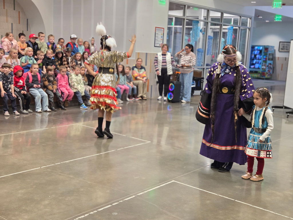 Kindergarten watching Native American presentation.