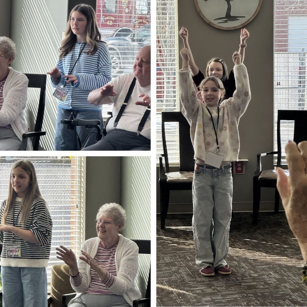 Students leading arm workouts at an assisted living home.