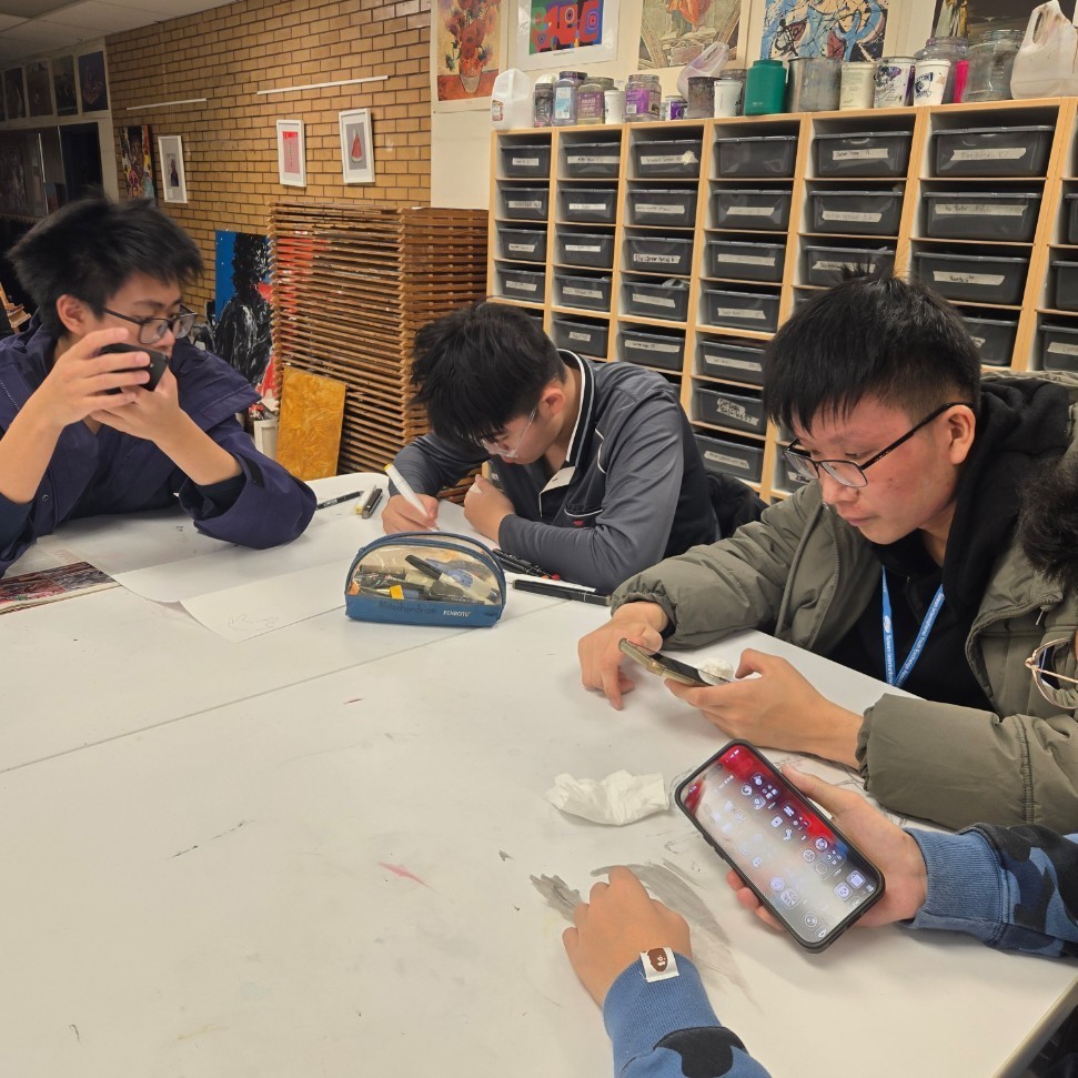 Taiwanese exchange students working on an art project
