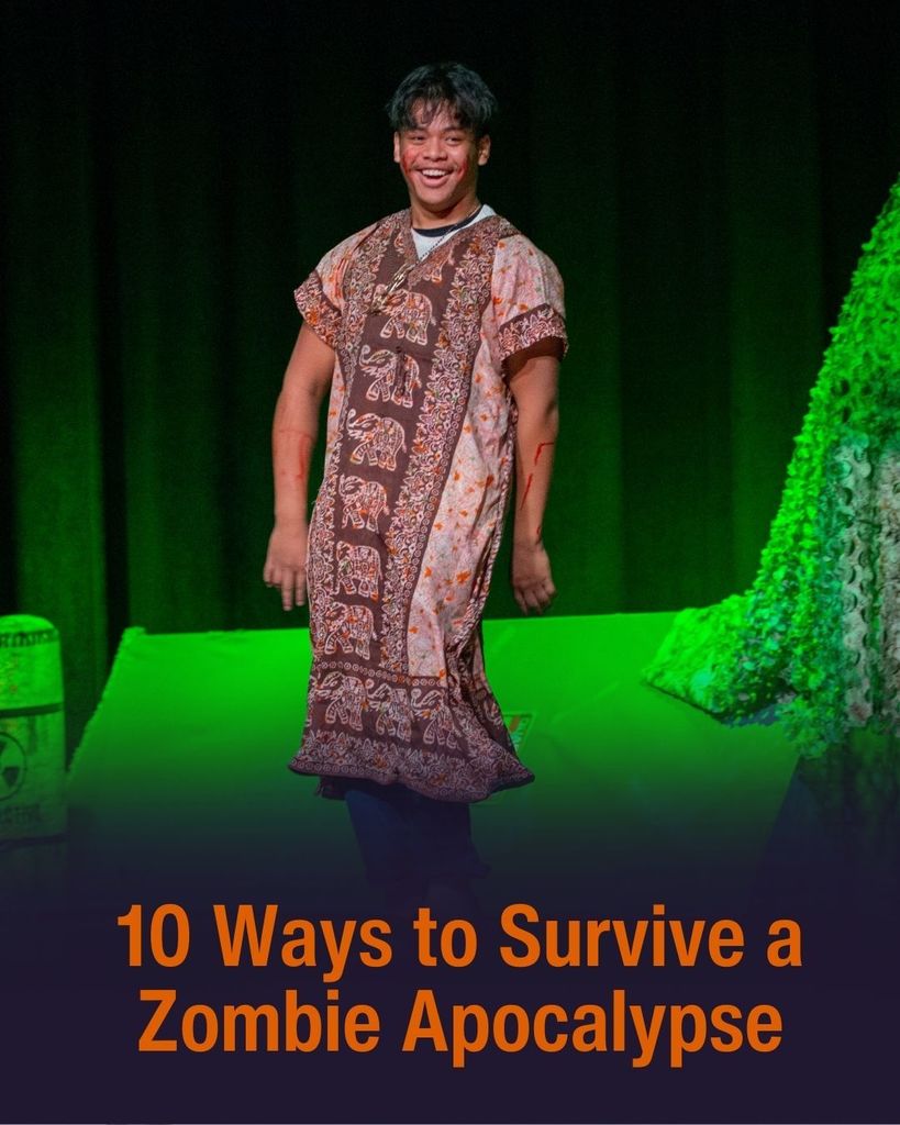 A male student stands on stage during the performance of 10 ways to survive a zombie apocalypse 