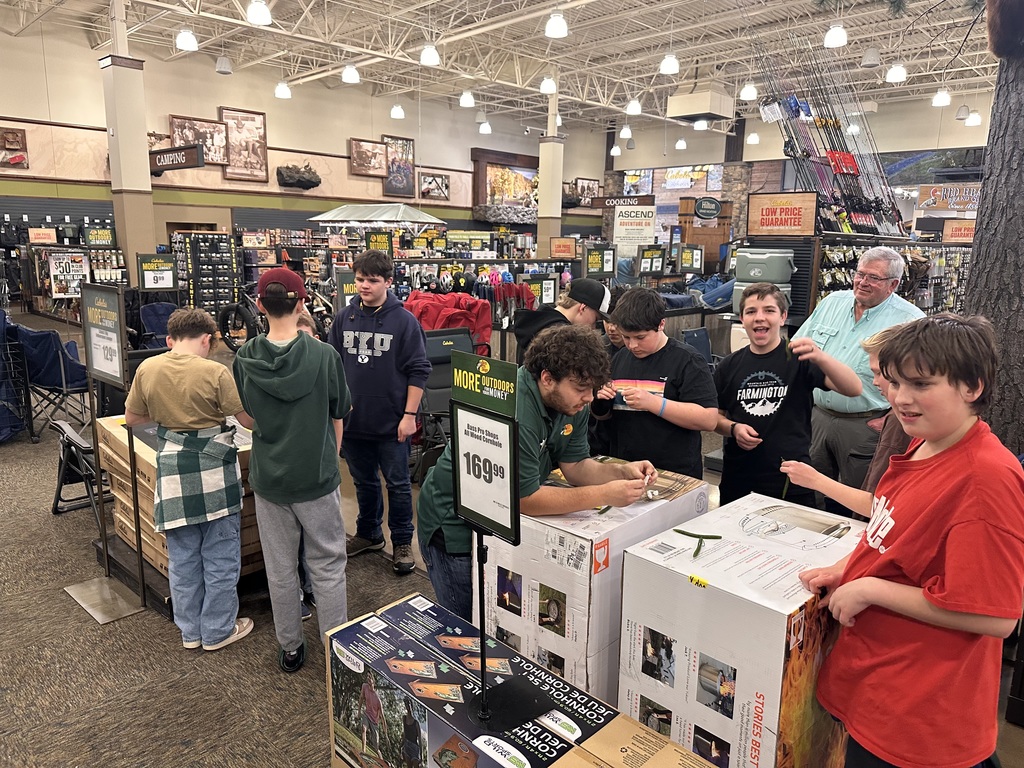 Enjoying  Cabela’s with the fishing club!