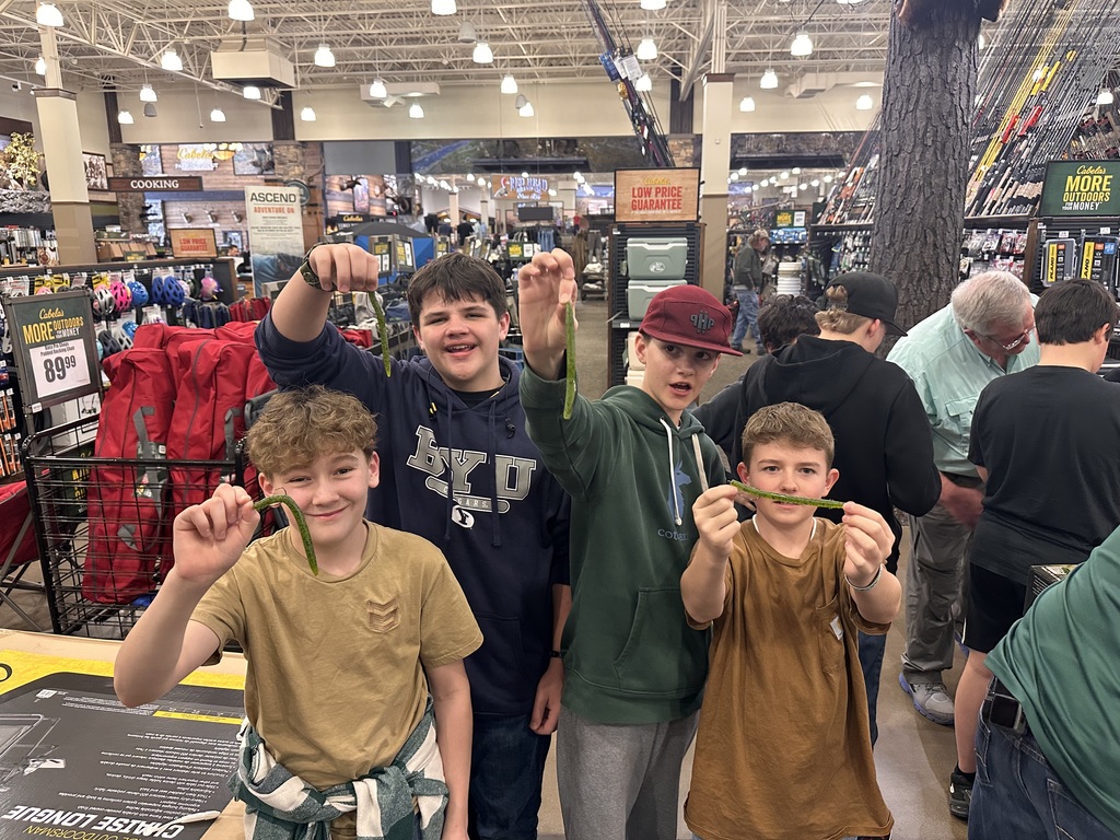 FJH fishing club students trying out fishing materials in Cabelaa. 