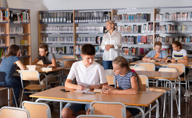 students in library