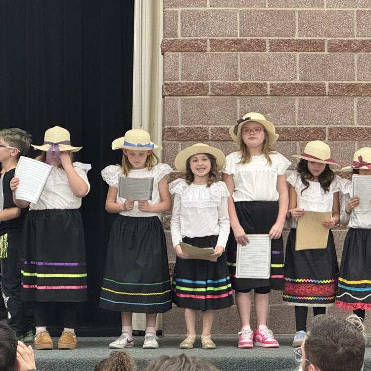 students doing Spanish presentation