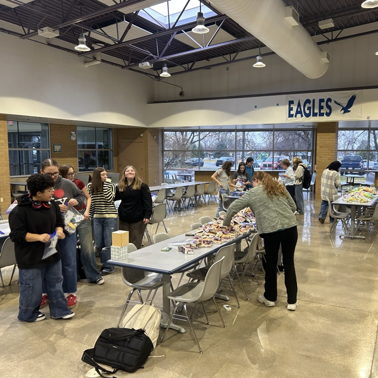 service club putting together hygiene kits