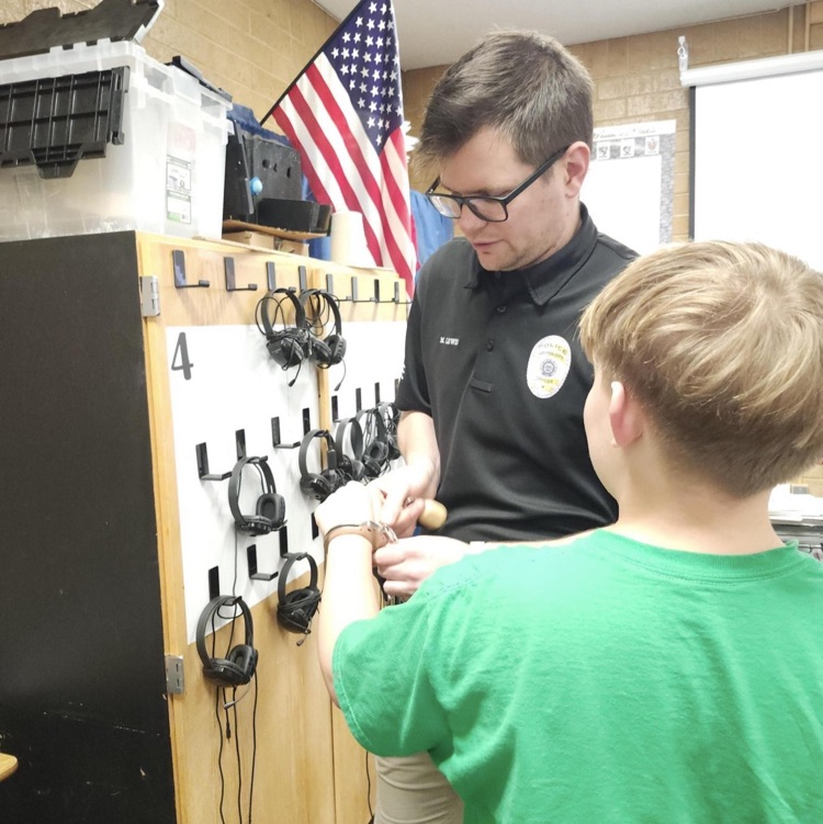 6th graders completing activities during a D.A.R.E. lesson