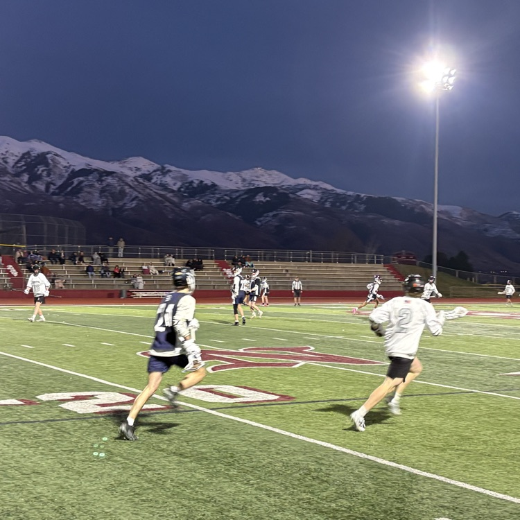 boys playing lacrosse