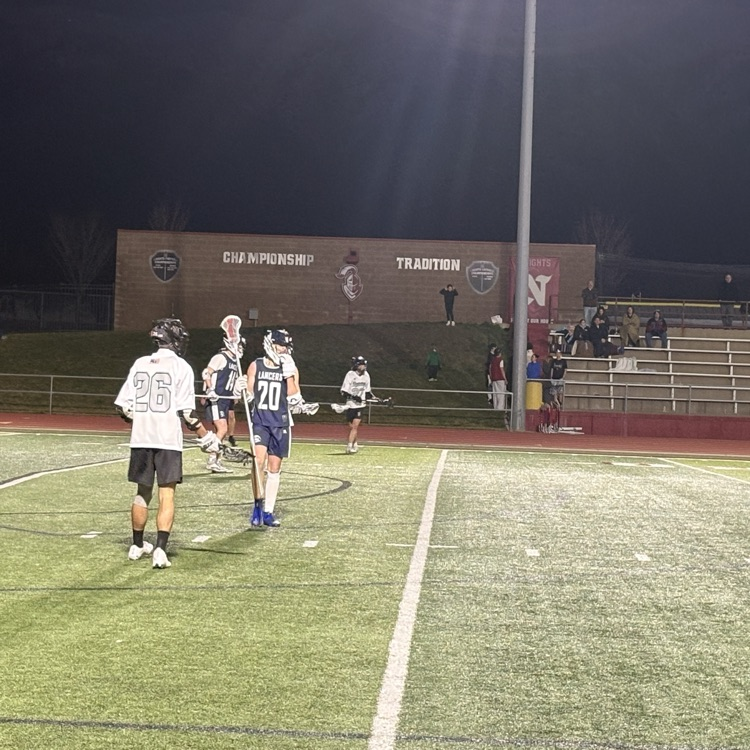 boys playing lacrosse