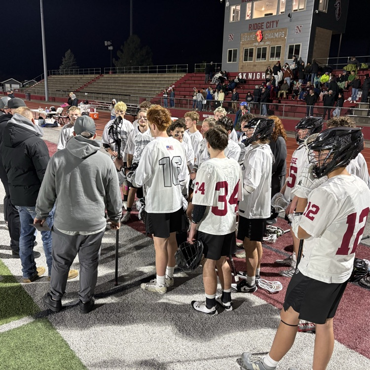 boys playing lacrosse