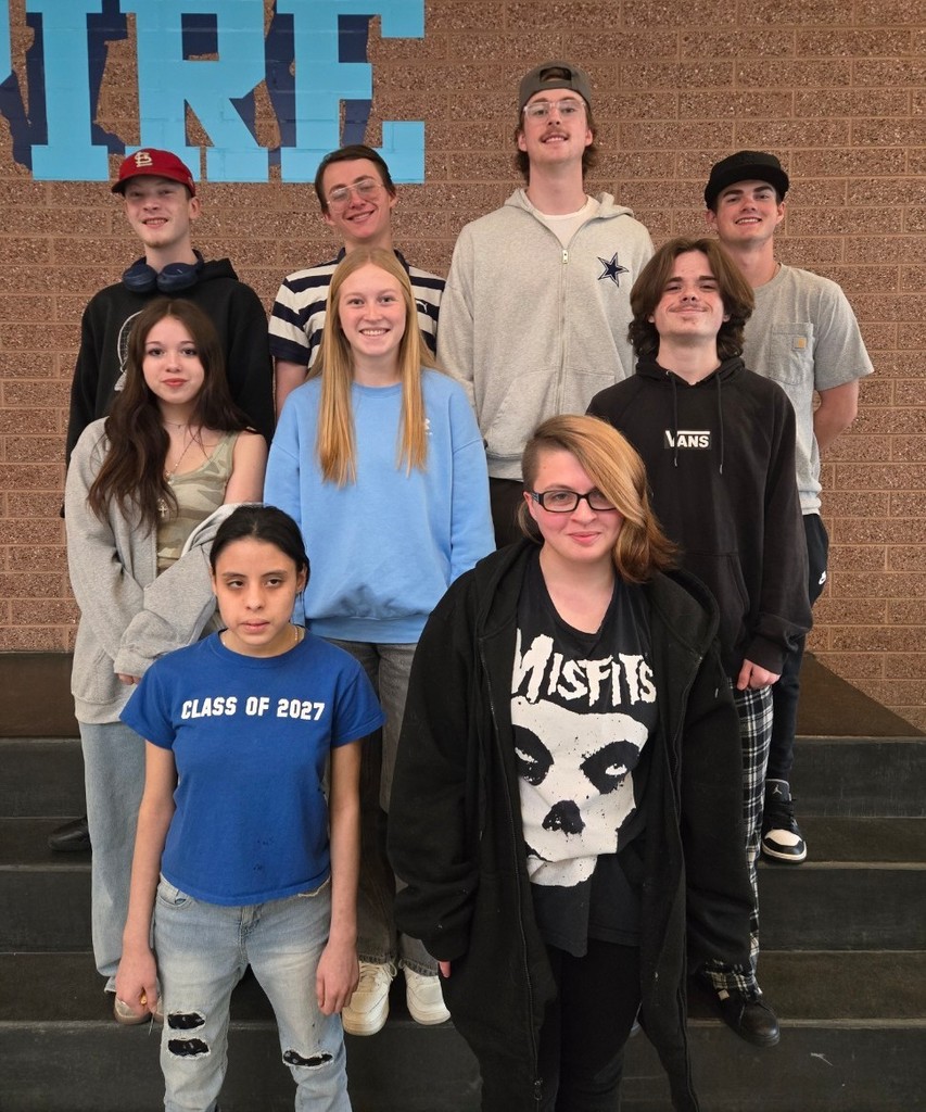 students of the month posing for a picture together