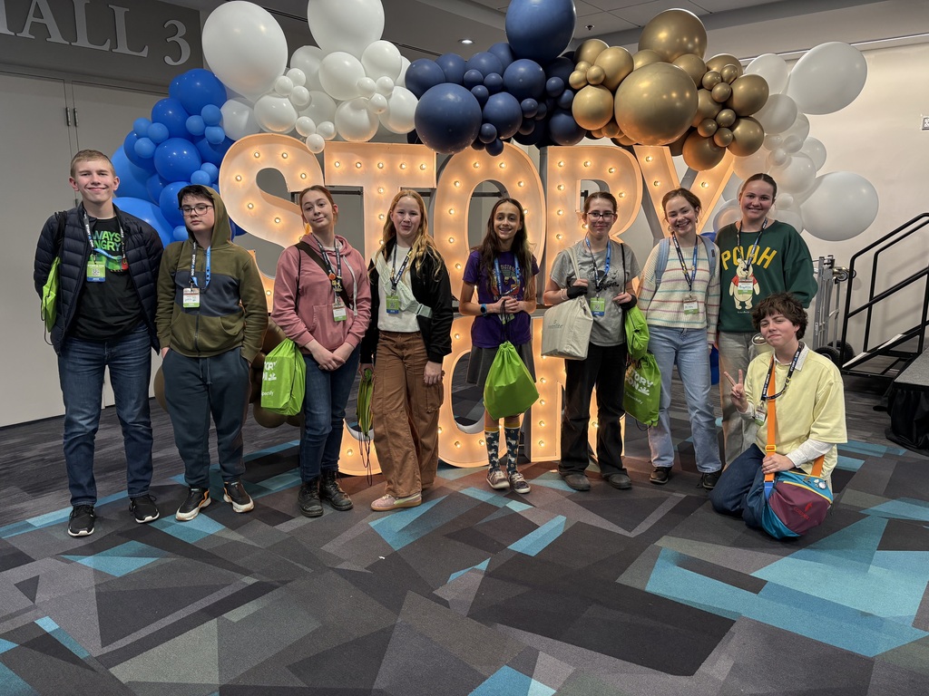 StoryCon with balloon arch in background for some of our students. 