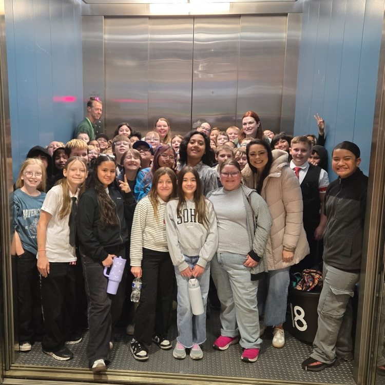5th grade students on a giant elevator for Biztown.