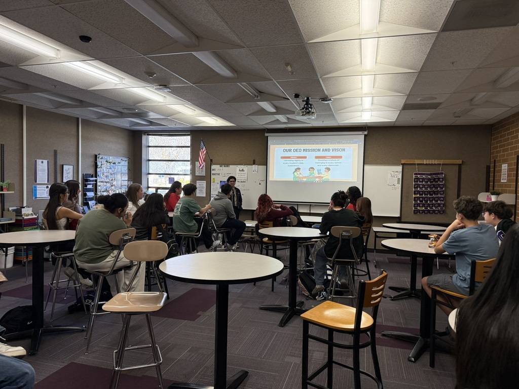 Students in a Classroom looking at a screen