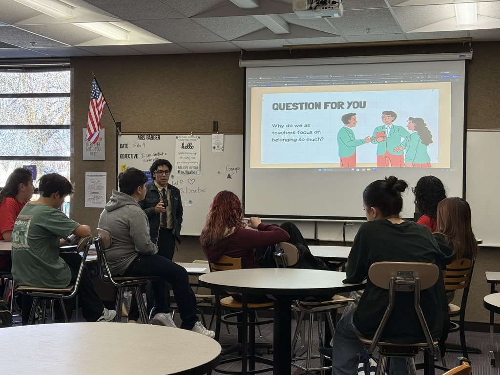 Students in a Classroom looking at a screen