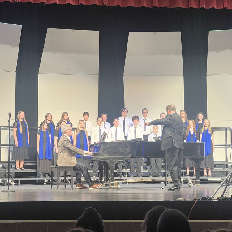 choir on stage singing