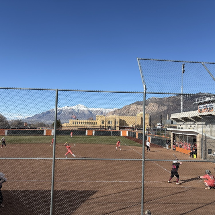 girls playing softball