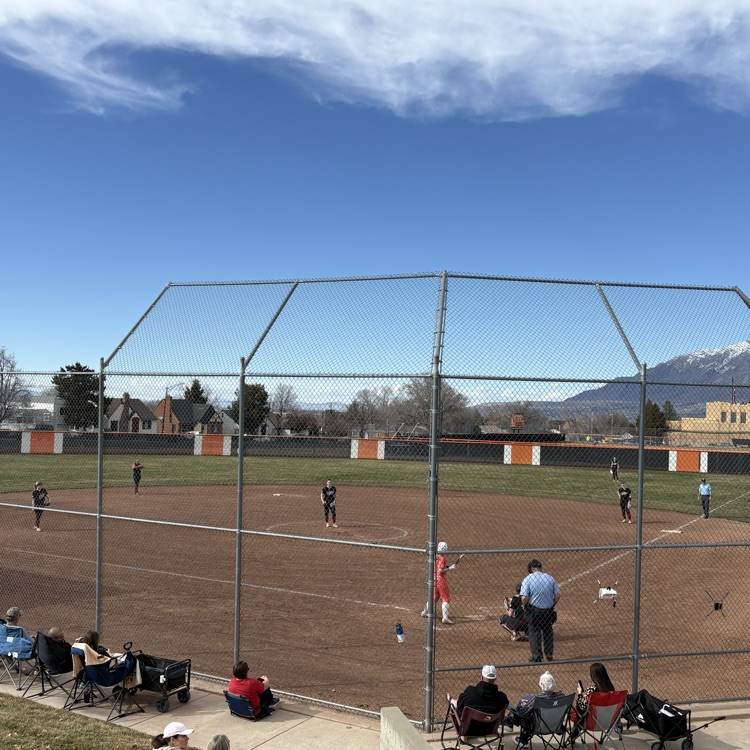 girls playing softball