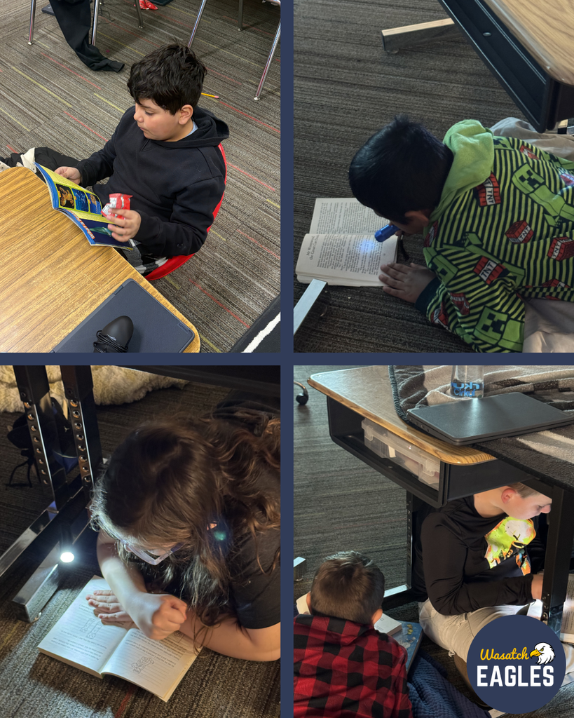 A collage of four classroom reading scenes shows students reading in creative spots around the room: one student sits at a desk holding an illustrated book and a small snack; another lies on the carpet wearing a green hoodie decorated with cars, shining a small flashlight onto a chapter book; a third reads under a desk illuminated by a clip‑on light; and two more sit beneath a desk, one eating a snack while holding a book and the other lying on the floor reading. The images capture various cozy reading positions on classroom carpet and under desks.