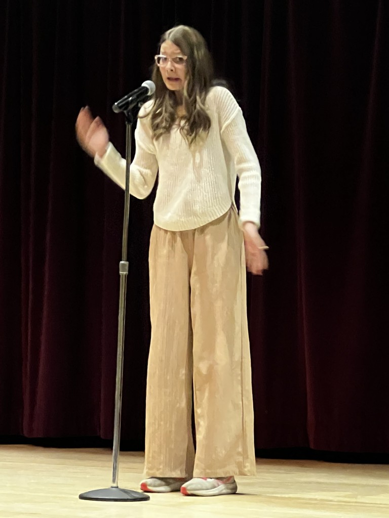 Student animatedly telling a story at the WSU storytelling festival