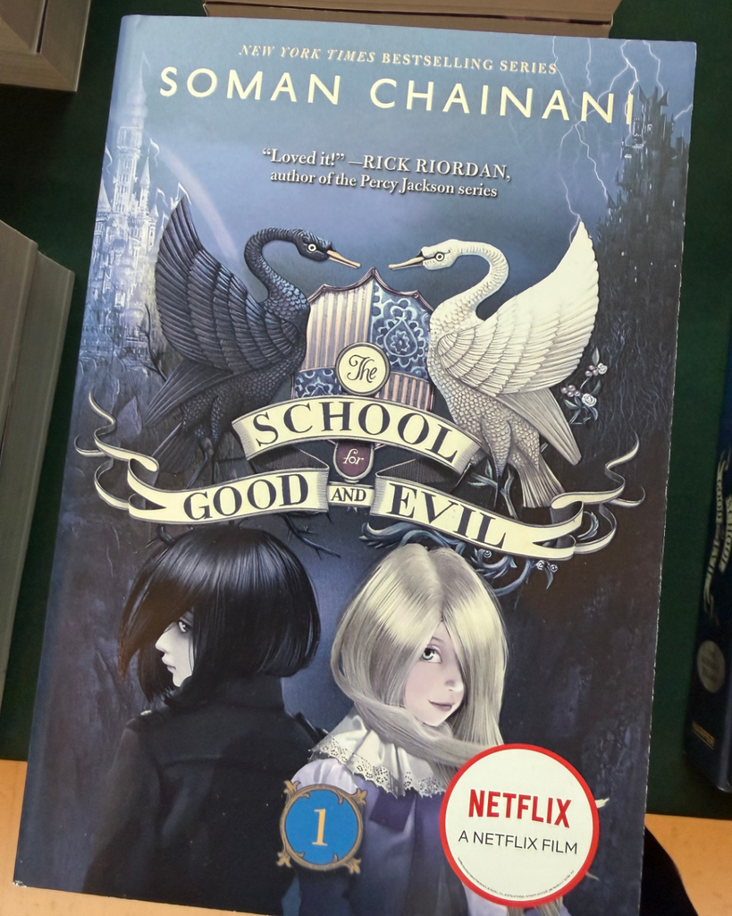 A photo of the book cover of the school for good and evil by New York Times Bestselling Series Soman Chainani. "Loved it!" - Rick Riordan, author of the Percy Jackson series. Book 1. A Netflix Film.