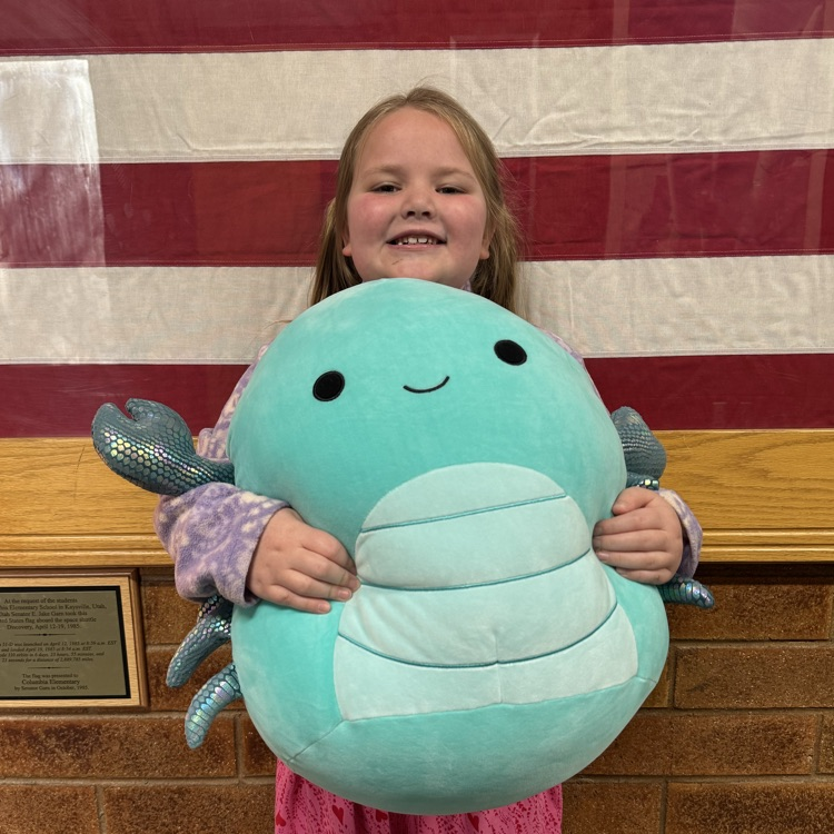 Attendance winner posing with prize  