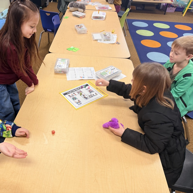 students playing a game during a lesson from the school counselor