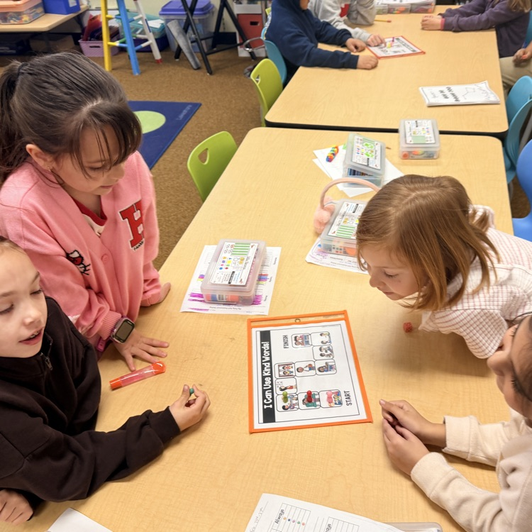students playing a game during a lesson from the school counselor