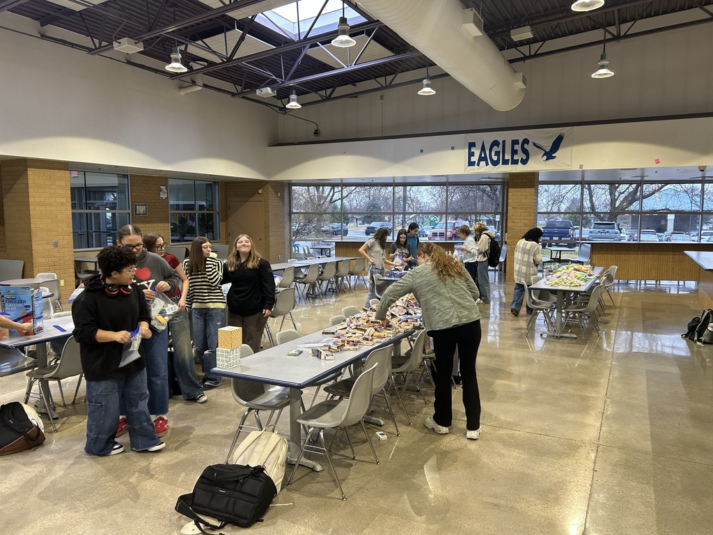 Students assembling hygiene kits.