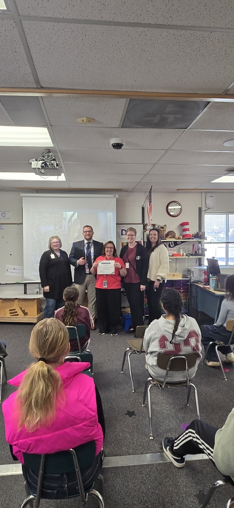 Mrs. Allred being presented with the district S.P.A.R.K.L.E. award