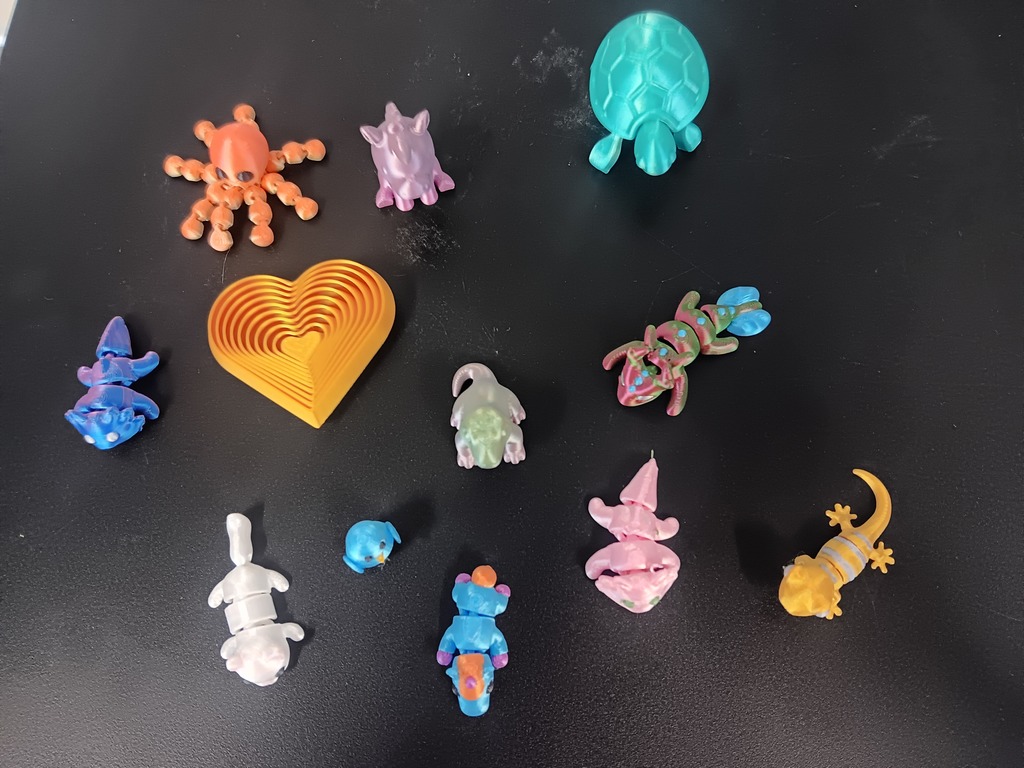 3d printed animals and shapes including octopus, lizard, turtle and heart