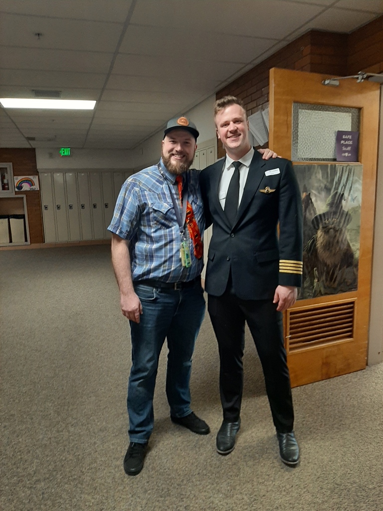 Mr Wadsworth and Captain Lloyd Standing together in hallway