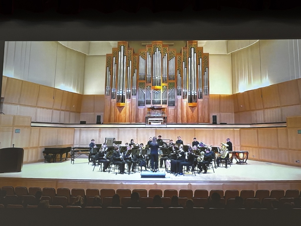 Sunset Junior High Band plays at the UMEA State Junior High Band Festival  in the Libby Gardner Hall at the University of Utah .