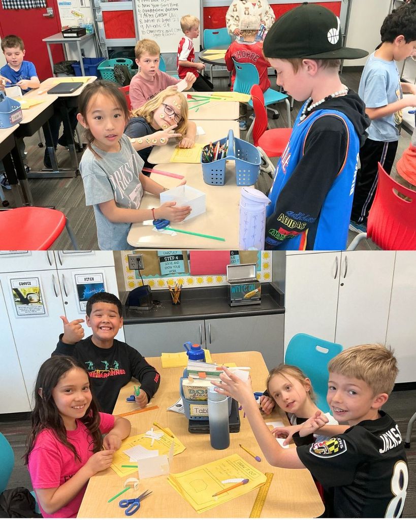 A group of third grade students collaborate at desks using paper, straws, scissors, and pencils to build model houses for a weather and wind science challenge.