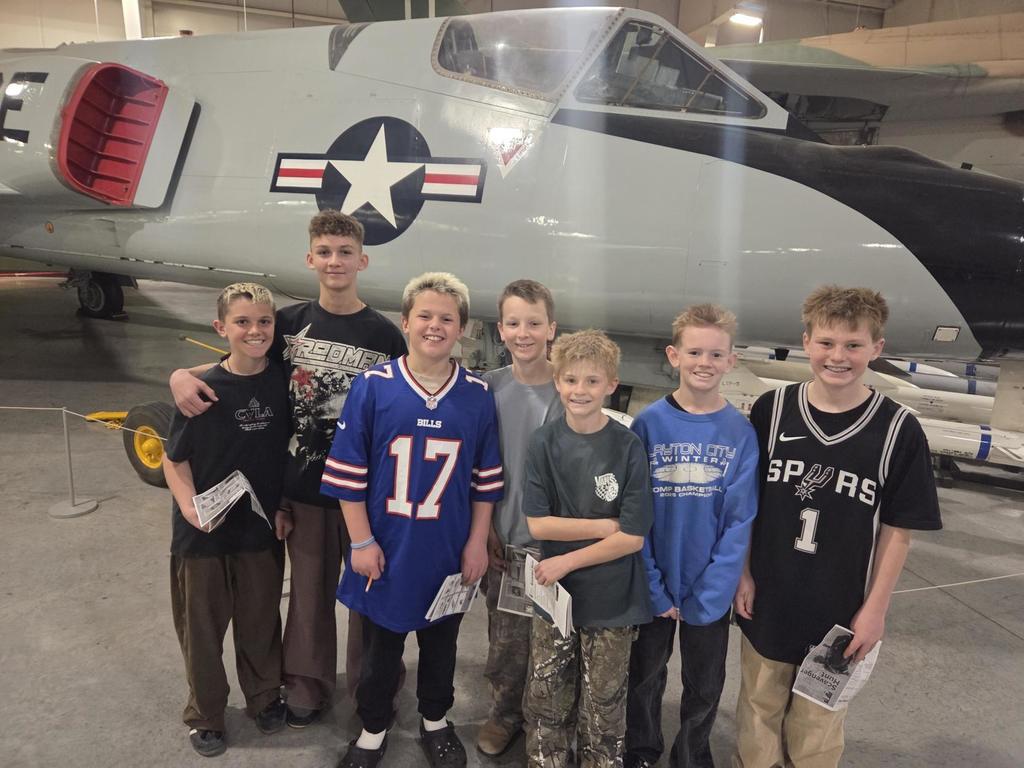 Groups of sixth grade students pictured with planes at the HAFB Aerospace Museum.