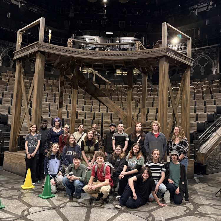 Tech Students standing on the stage at Halle center theater