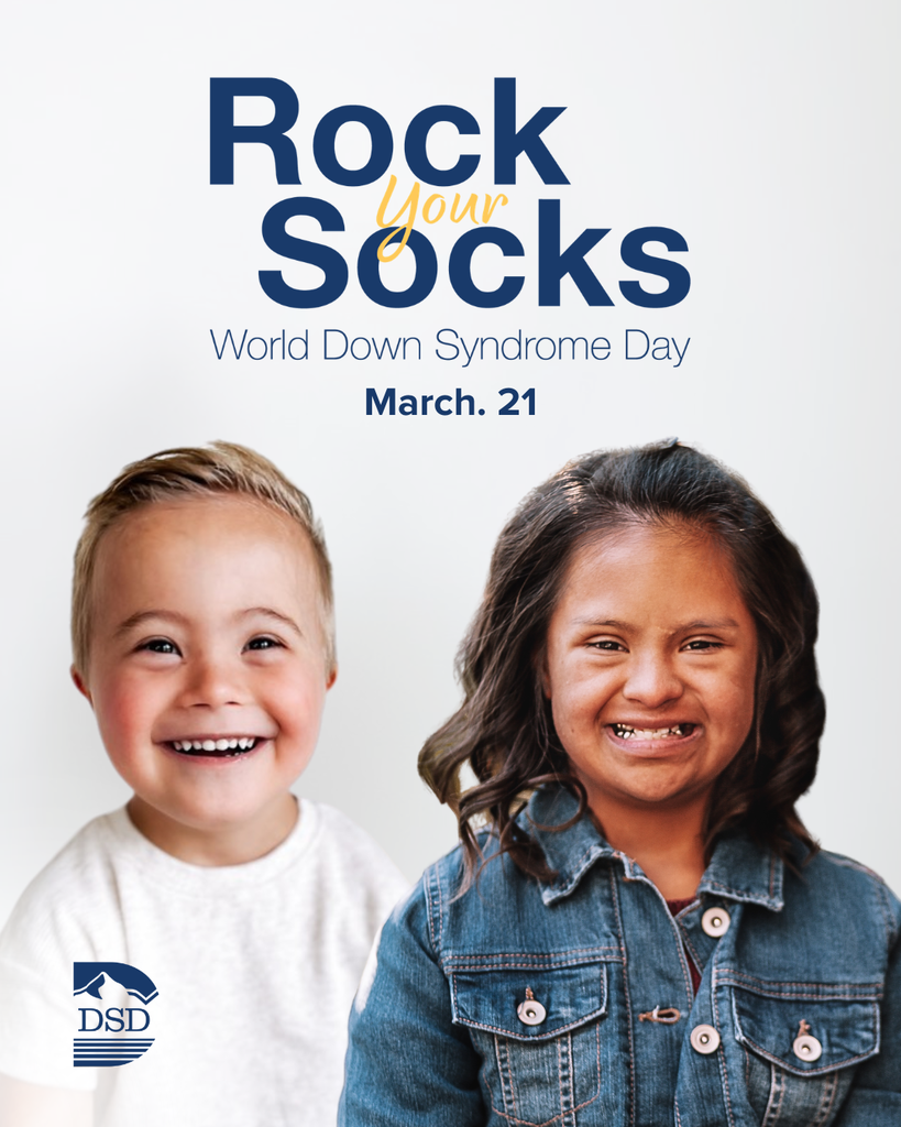 Rock your socks World Down Syndrome Day March 21. Two students smiling with the Davis School District logo. 
